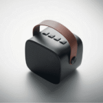 Employee receiving corporate gift wireless speaker